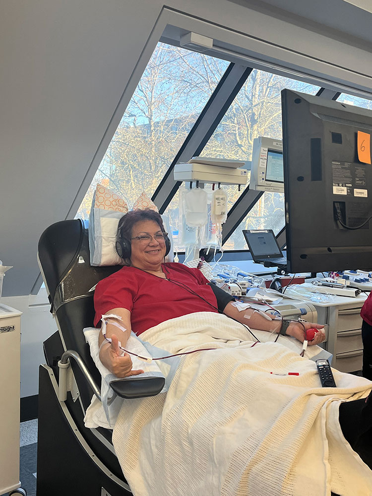 Lynn Sivaivai donating platelets at the newly renovated Portland Blood Donor Center.