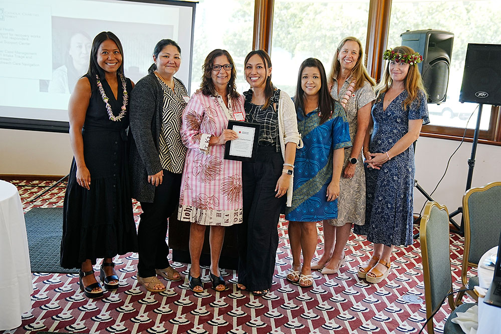 Catholic Charities Hawaii team group phot at a Red Cross event.