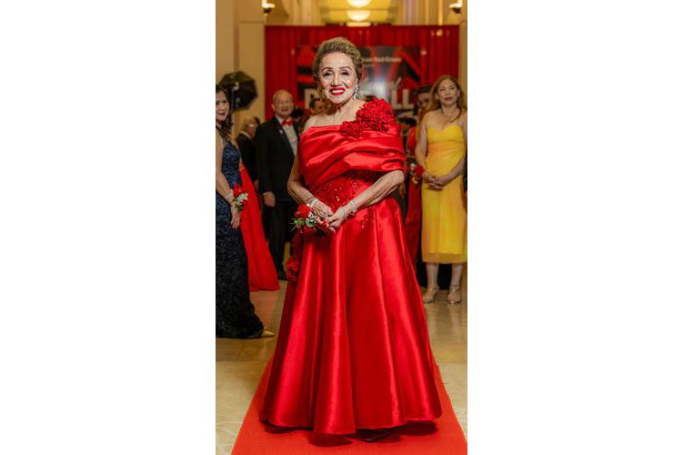 Chita Blaise in a custom gown at a Red Cross event.