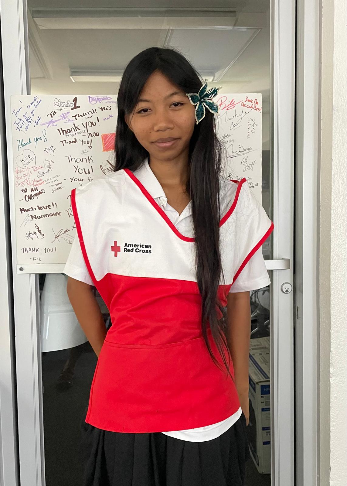 volunteer daverish in red cross vest