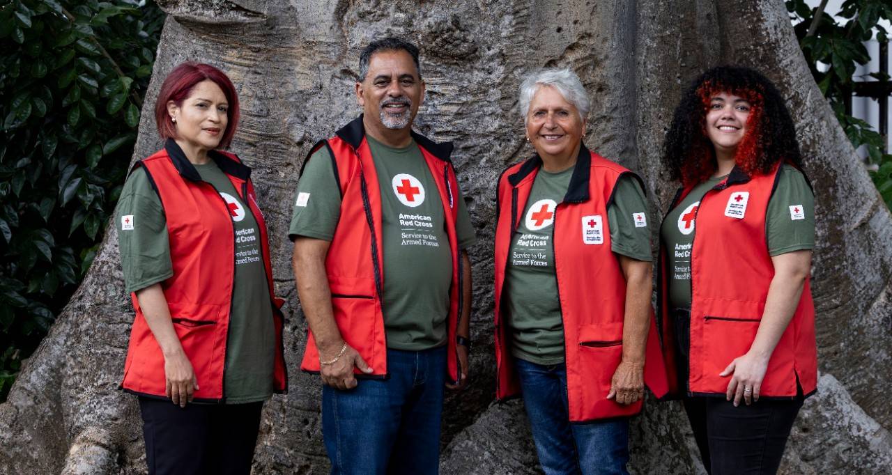 May 10, 2024.  San Juan, Puerto Rico. 
Teresa Marrero, Henry Ayala, Carmen Hernández, Gabriela Santiago volunteer with Service to the Armed Forces providing comfort and care to military members, veterans and their families with the American Red Cross Puerto Rico Chapter (Cruz Roja Americana Capítulo de Puerto Rico). 
Photo by Scott Dalton/American Red Cross 