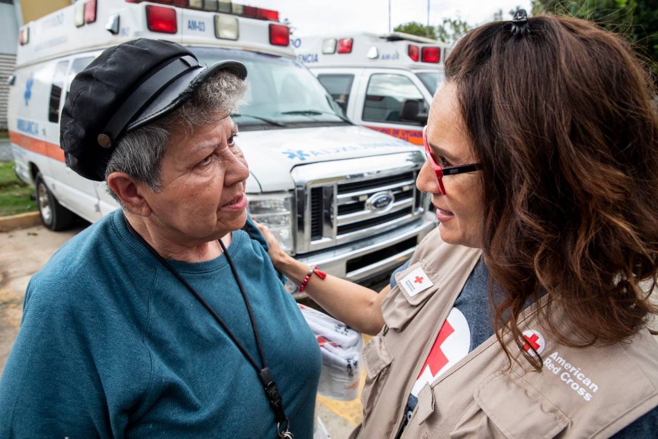 January 23, 2020. Utuado, Puerto Rico.
Red Crosser Grace comforts Brunilda, an Utuado resident who recently relocated from the United States.  I am very scared 
Photo by Scott Dalton/American Red Cross