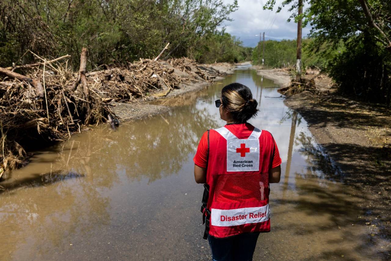 September 24, 2022. Buyones, Puerto Rico.Sherleen Velasquez from the Red Cross views damage caused by flooding in the Buyones community Puerto Rico after Hurricane Fiona.Photo by Scott Dalton/American Red Cross