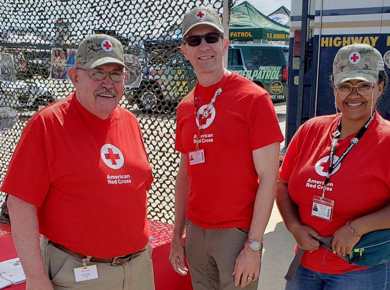 Group of three Red Cross volunteers smiling