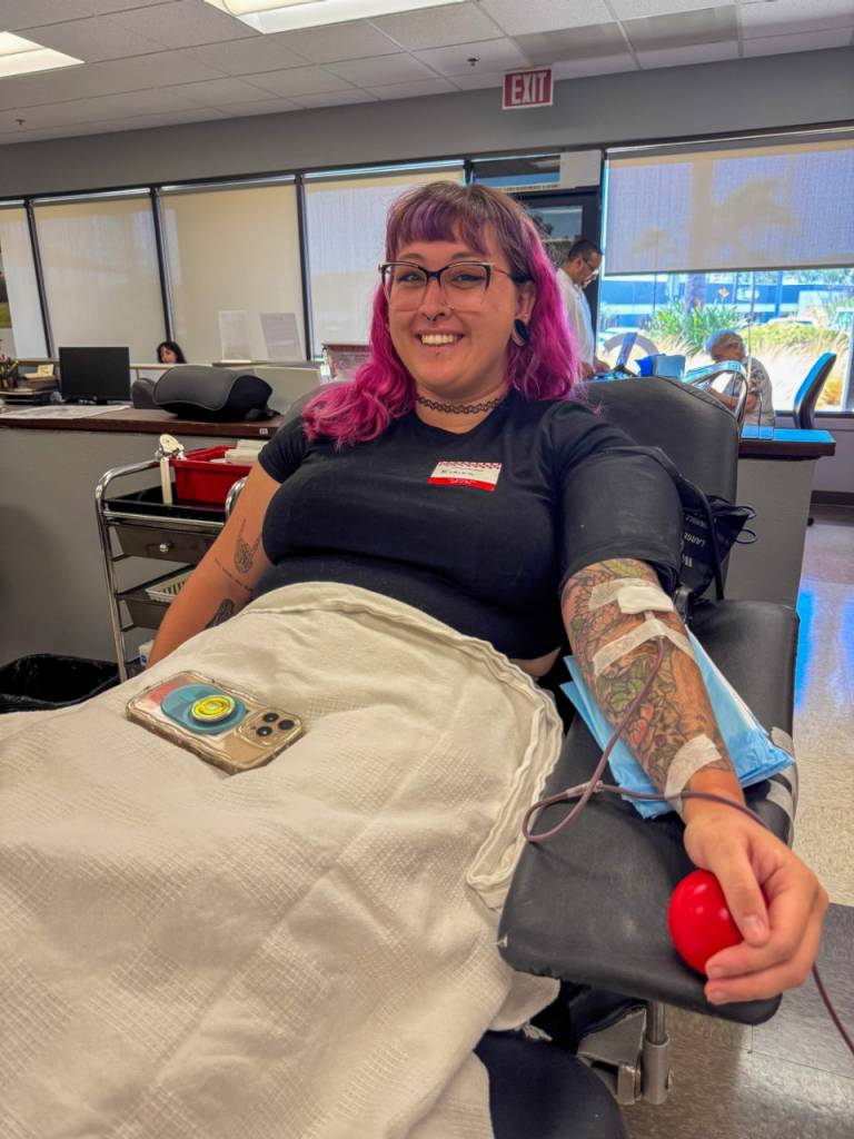 Woman donating blood.