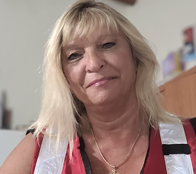 Janette Dearing wearing a Red Cross vest 