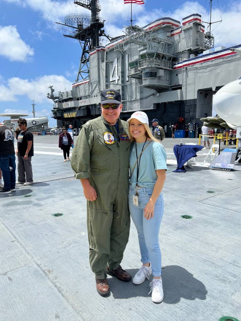 Father and daughter pictured aboard ship.