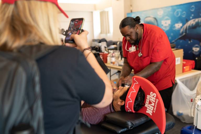 Naomi Taking Video Footage at Red Cross Blood Drive 