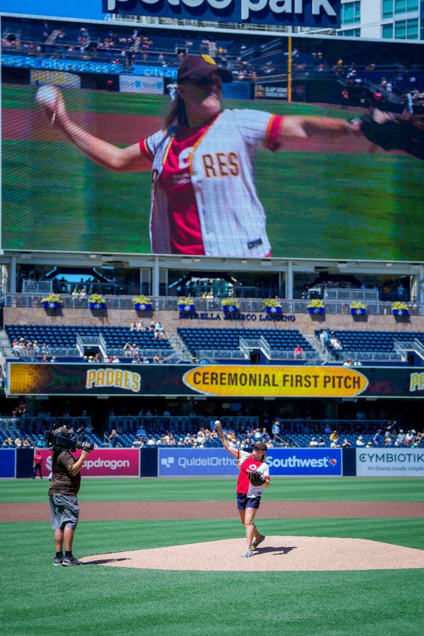Melissa throwing the ceremonial first pitch