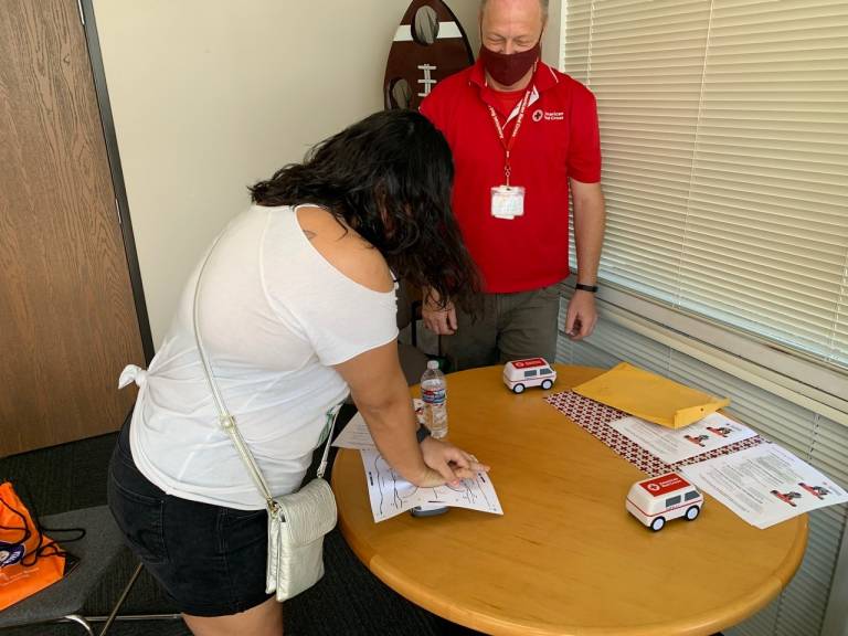 blood donor learns hands only cpr