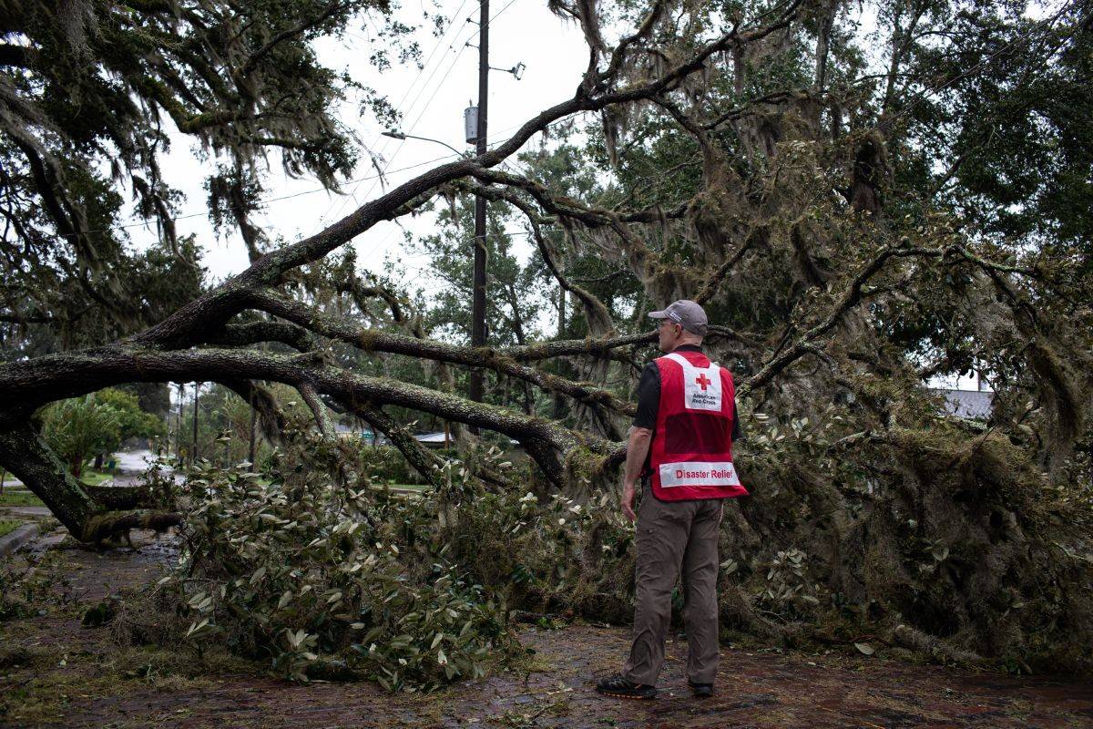 September 29, 2022. Orlando, Florida
Red Cross volunteer Dave Wagner surveys the Delaney Park neighborhood of Orlando, Fl., the morning after Hurricane Ian ravaged the state. High winds and heavy rains caused widespread property damage and dangerous conditions persisted as flood waters continued to rise.
Photo by Marko Kokic/American Red Cross