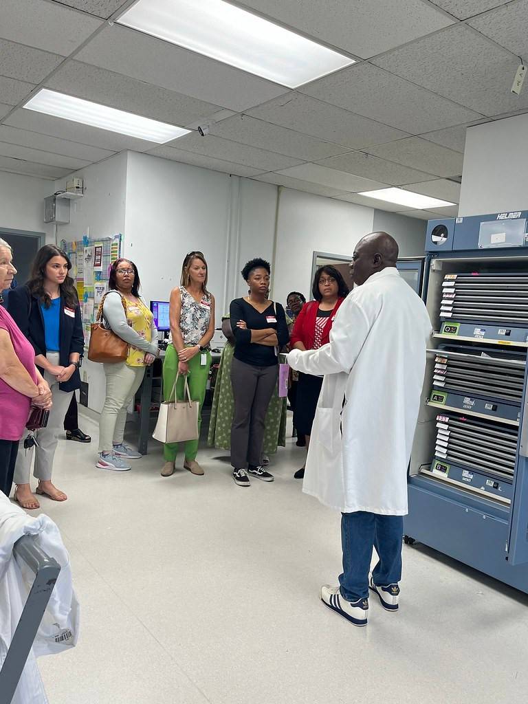 Blood Distribution Manager for the American Red Cross of South Carolina Mario Jenkins takes Blue Cross employees through lab.