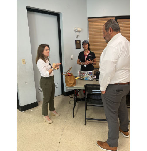 Susy Rodriguez, Deborah Koch and Sergio Abreu in room talking with each other.