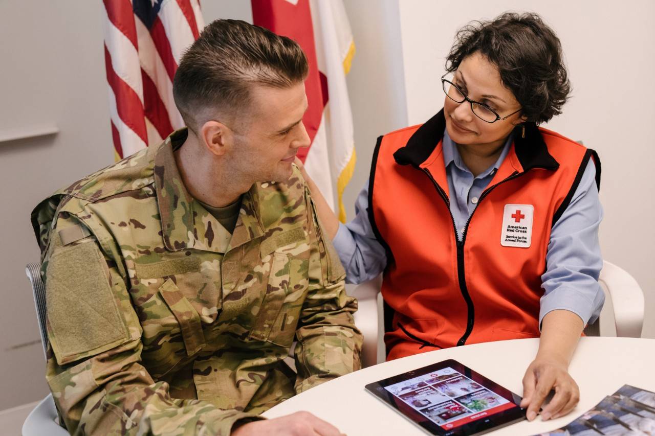 June 21, 2018. Washington, DC. Development SAF Stock Photography Project 2018.
Toressa Romanik is a caseworker for SAF, as well as the wife of a veteran. As a volunteer, what she does "is try to help them in their time of need, when they're going through a crisis: whether it's a loss of a loved one, whether someone's in hospice or there's a life-threatening illness, whatever the case may be, we're there for them." After looking for a non-profit organization to volunteer with, Romanik settled on the American Red Cross' SAF program because "we can give something back to these guys who have sacrificed everything for us." Through her experiences, one stands out in particular, "I had a client and she opened up to me and told me her entire life story within under five minutes, but she basically said she felt I was family. I felt there was a real sense of a personal connection. She was just so appreciative and thankful for what we do at the Red Cross." Although she finds it challenging, she believes in the positive impact she is able to make in another person s life through the Red Cross.
Photo by Roy Cox/American Red Cross