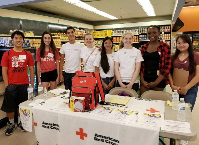 Hailey and the club at a fire safety event