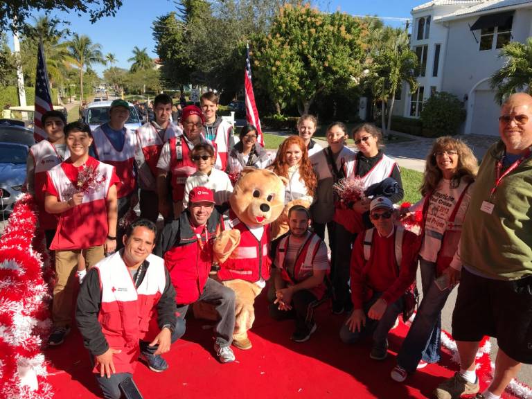 Hailey and the club in a parade
