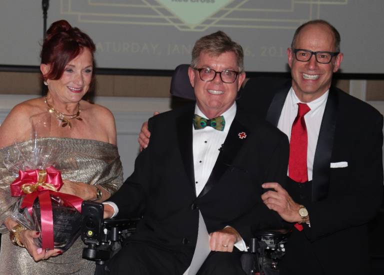 Tom Callahan receives the 2019 Humanitarian of the Year Award at the Spottswood Gala in Key West.