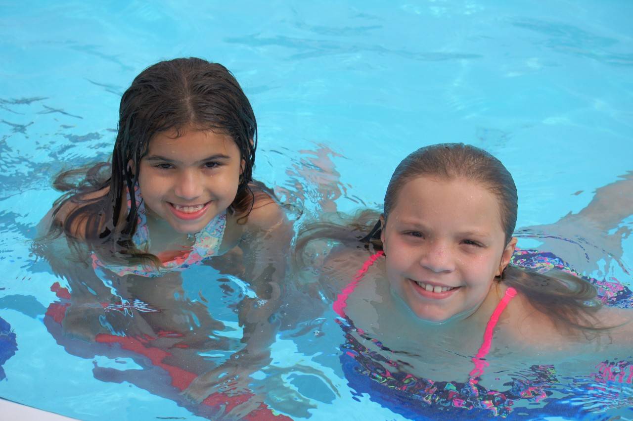 June 12, 2017. City of Haines City Parks and Recreation, Florida. Isobella and Alejandra learning to swim as part of the Aquatics Centennial Campaign. Photo by Connie Harvey/American Red Cross