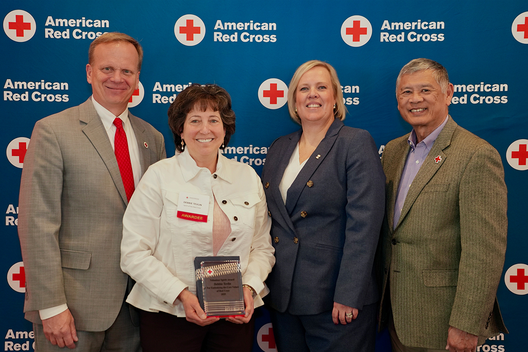 Red Cross volunteer Debbie Tevlin is pictured with Red Cross CEO Jennifer Graham, Delaware Valley Chapter Board Member John Susanin and Philadelphia Chapter Board Member Kenneth Wong 