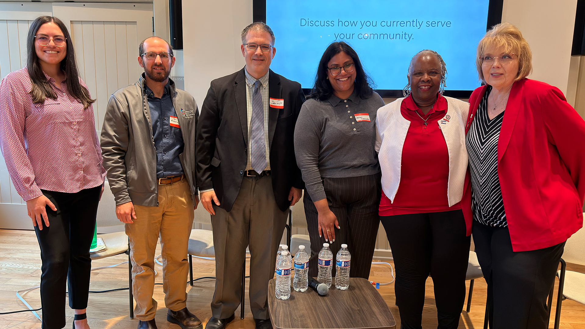 Photo of the 6 panelists and moderators from the Faith Responds event.