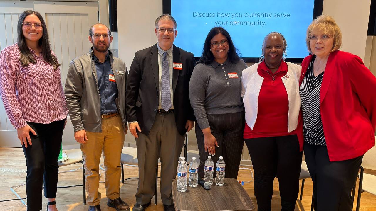 Photo of the 6 panelists and moderators from the Faith Responds event.