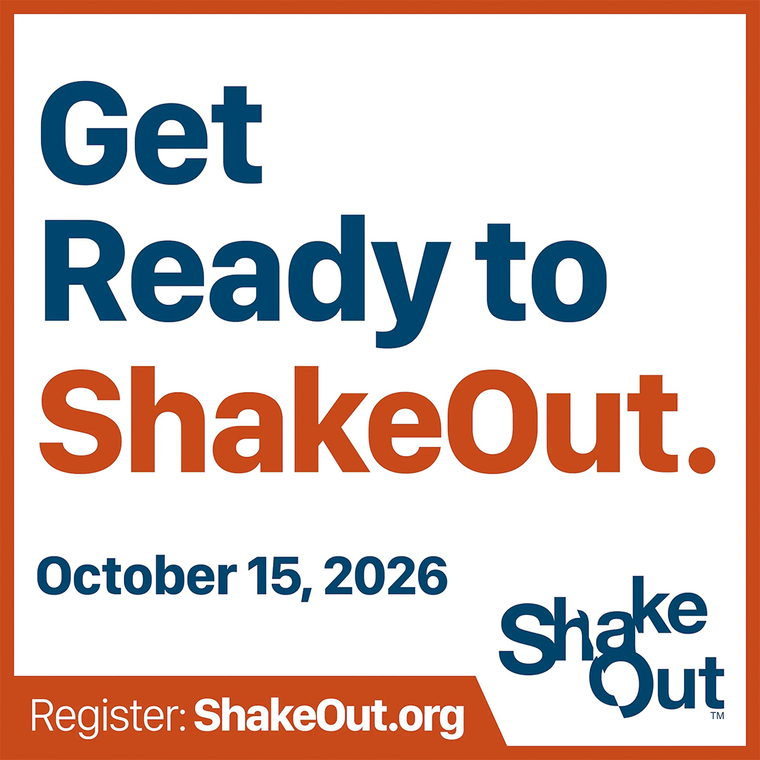 Promotional graphic for the Great ShakeOut earthquake drill featuring text reading "Get Ready to ShakeOut. October 15, 2026" with the ShakeOut logo and registration link "Register: ShakeOut.org".