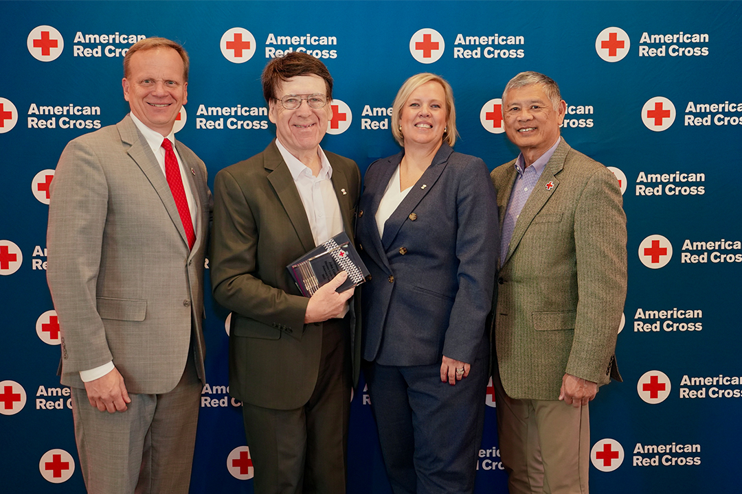 Red Cross volunteer John Gebhardt is pictured with Red Cross CEO Jennifer Graham, Delaware Valley Chapter Board Member John Susanin and Philadelphia Chapter Board Member Kenneth Wong