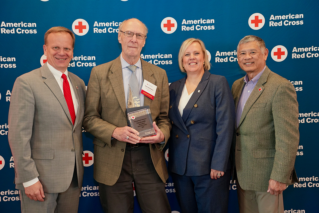 Red Cross volunteer Paul Reusille (second from left) is pictured with Red Cross CEO Jennifer Graham (second from right), Delaware Valley Chapter Board Member John Susanin (far left) and Philadelphia Chapter Board Member Kenneth Wong (far right). 