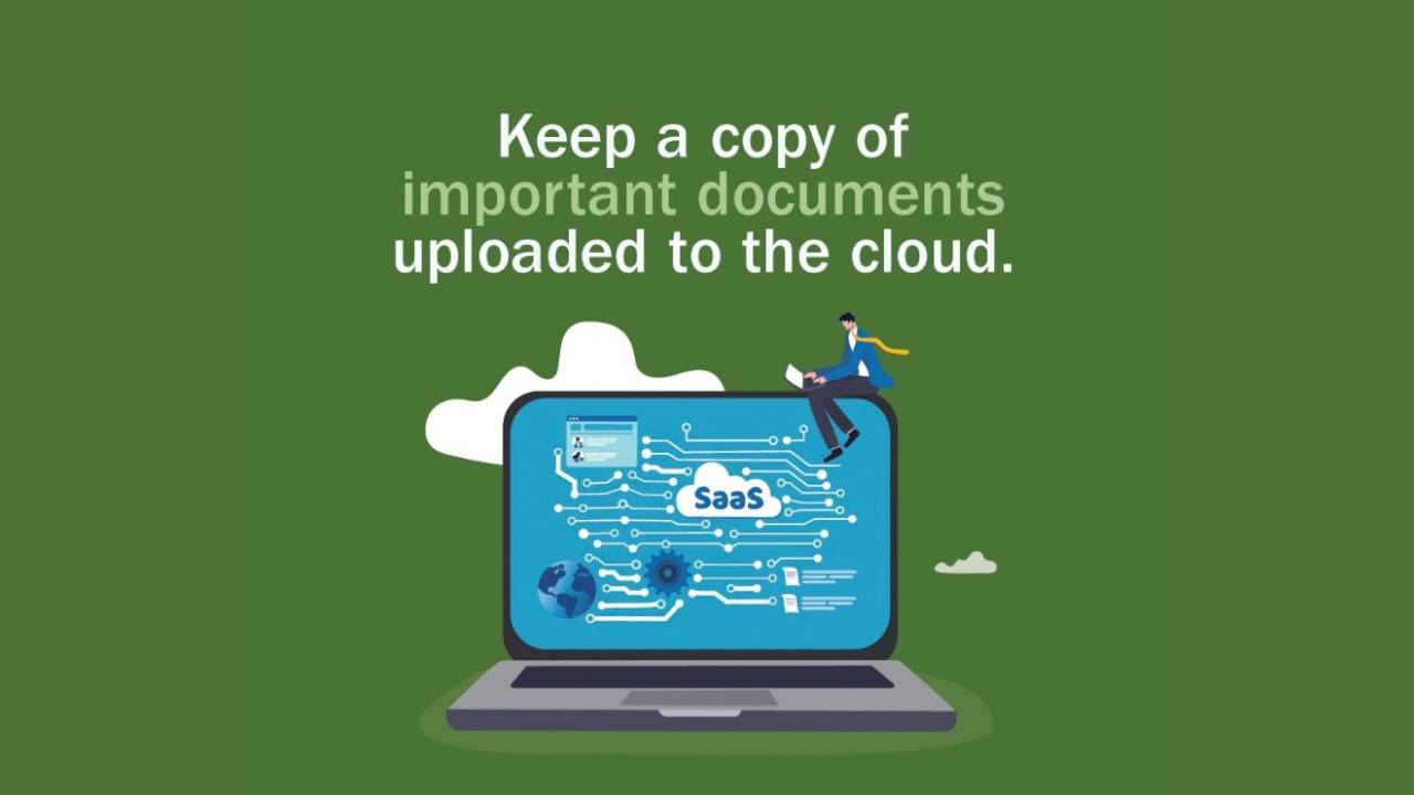 Graphic illustration on a green background with text reading "Keep a copy of important documents uploaded to the cloud." Below the text, a laptop displays a digital circuit layout with the letters "SaaS" in the center, alongside logos for FEMA and Ready.gov.