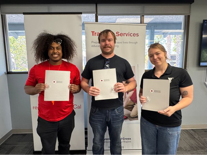 ymca lifeguards holding award certificates