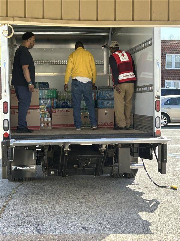 Volunteers unloading truck