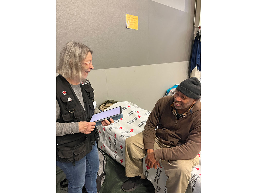 SRT volunteer Chris Hitchcock and resident Marc Flowers in a Red Cross shelter.