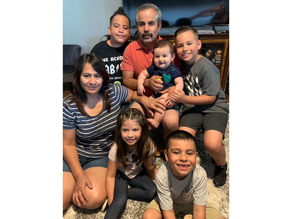 Jose Gonzalez with his wife and five children.