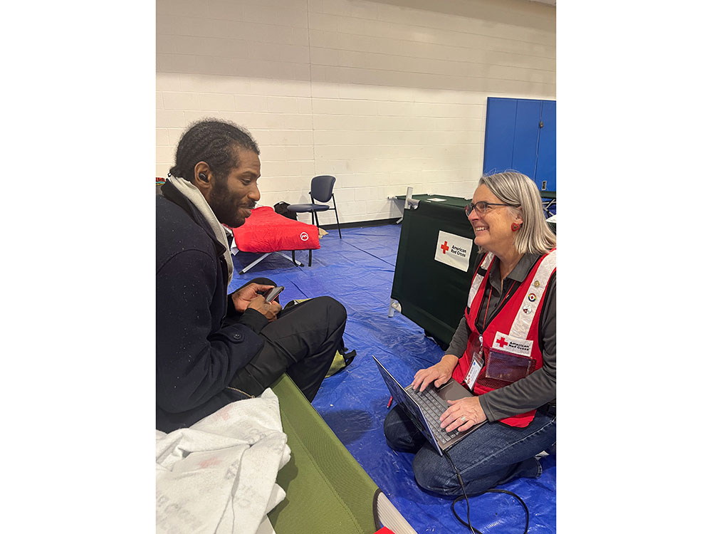 SRT volunteer Theresa Nelson and resident Chevan Williams in a Red Cross shelter.