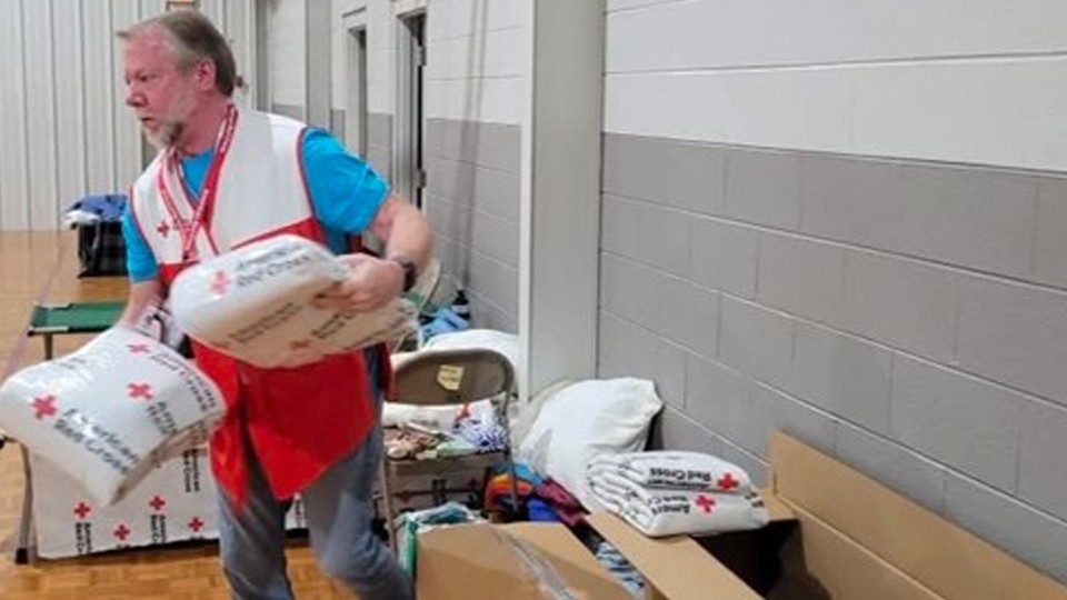 Todd Barrack helps at an American Red Cross shelter.