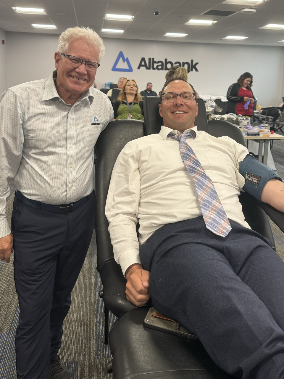 Bob Wright and Judd Austin donating blood