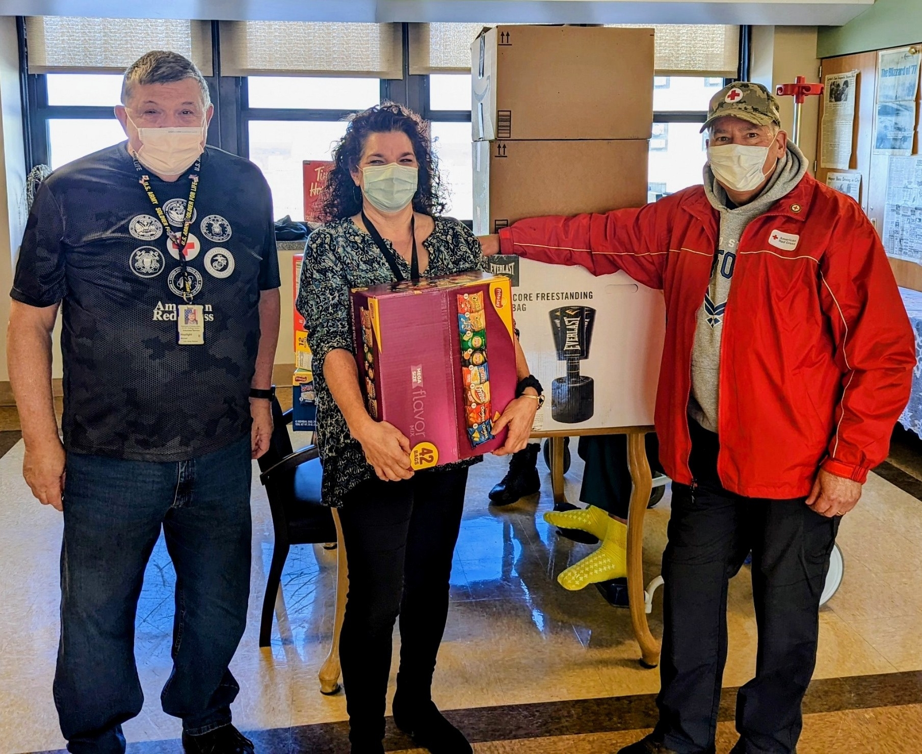 Three individuals with face masks