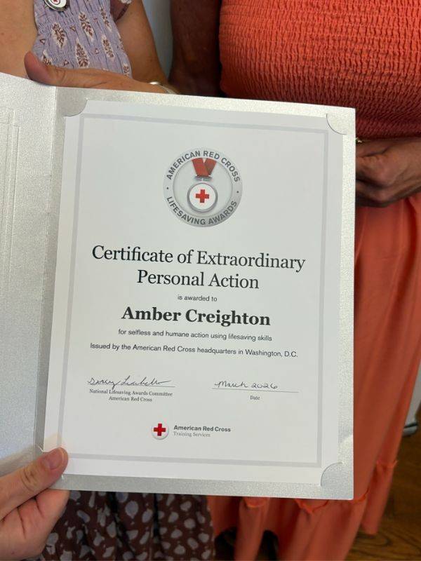 closeup of certificate of extraordinary personal action to amber creighton