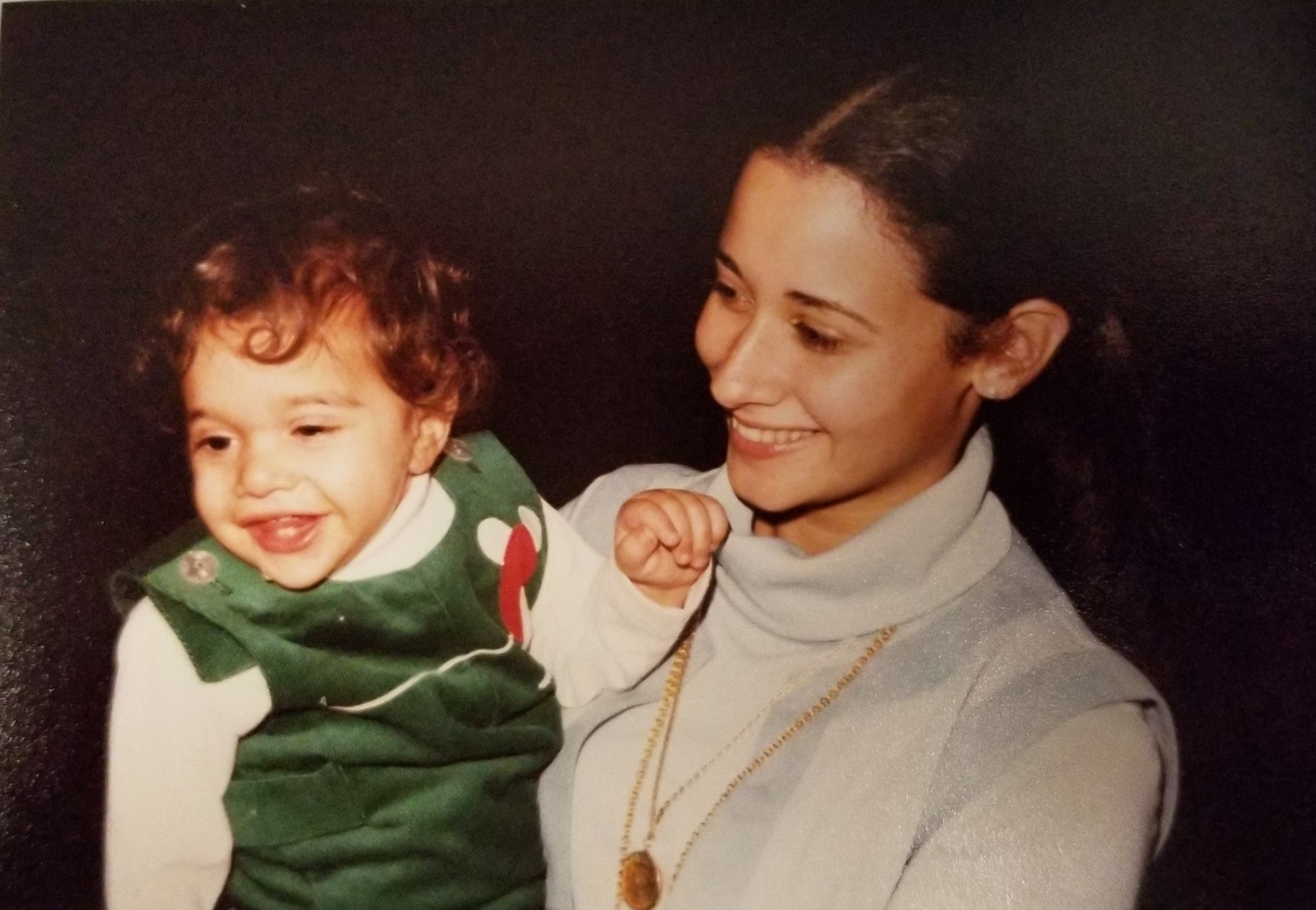 young gail singer holding child