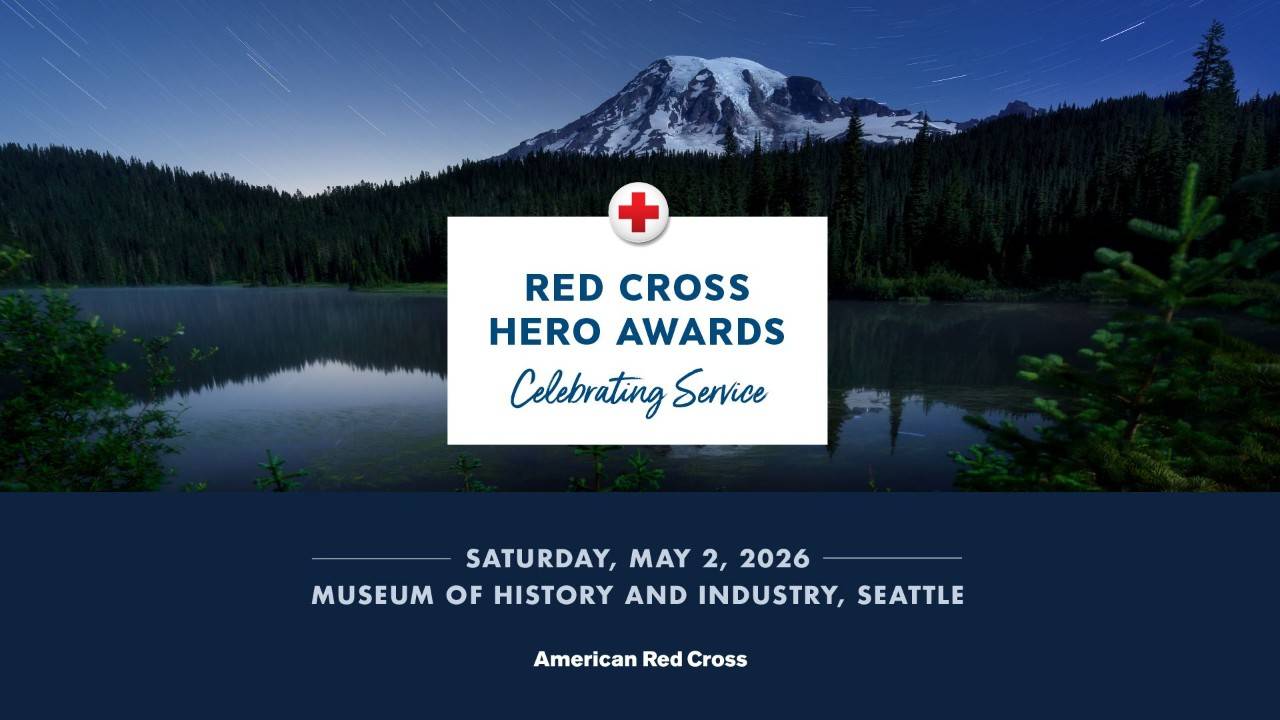 heroes award banner with mountain and lake imagery