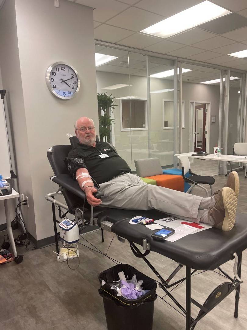John donates blood at Red Cross blood drive