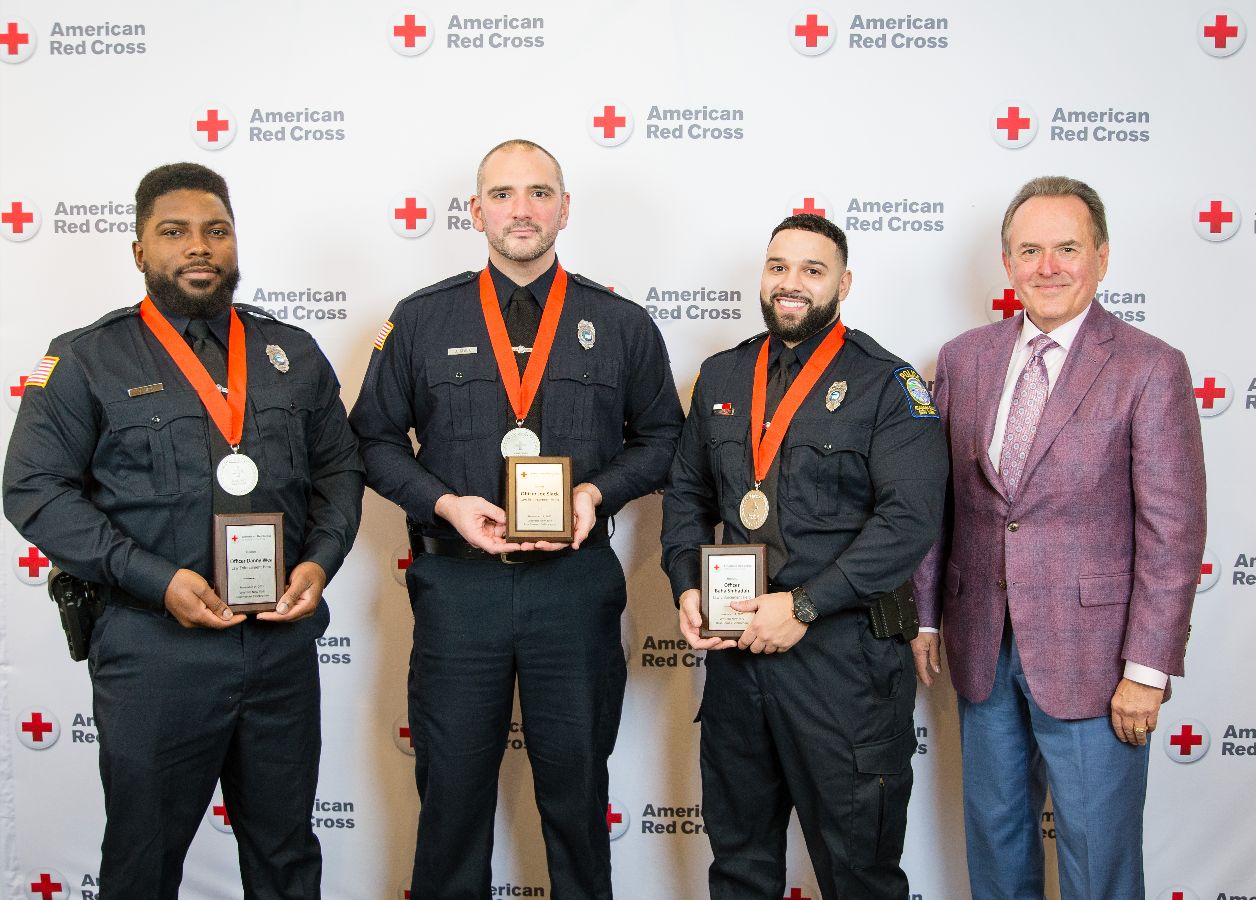 A group of police officers wearing medals