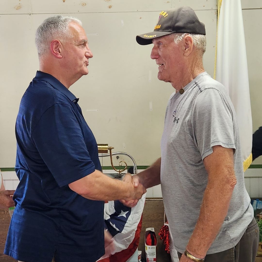 two men shaking hands