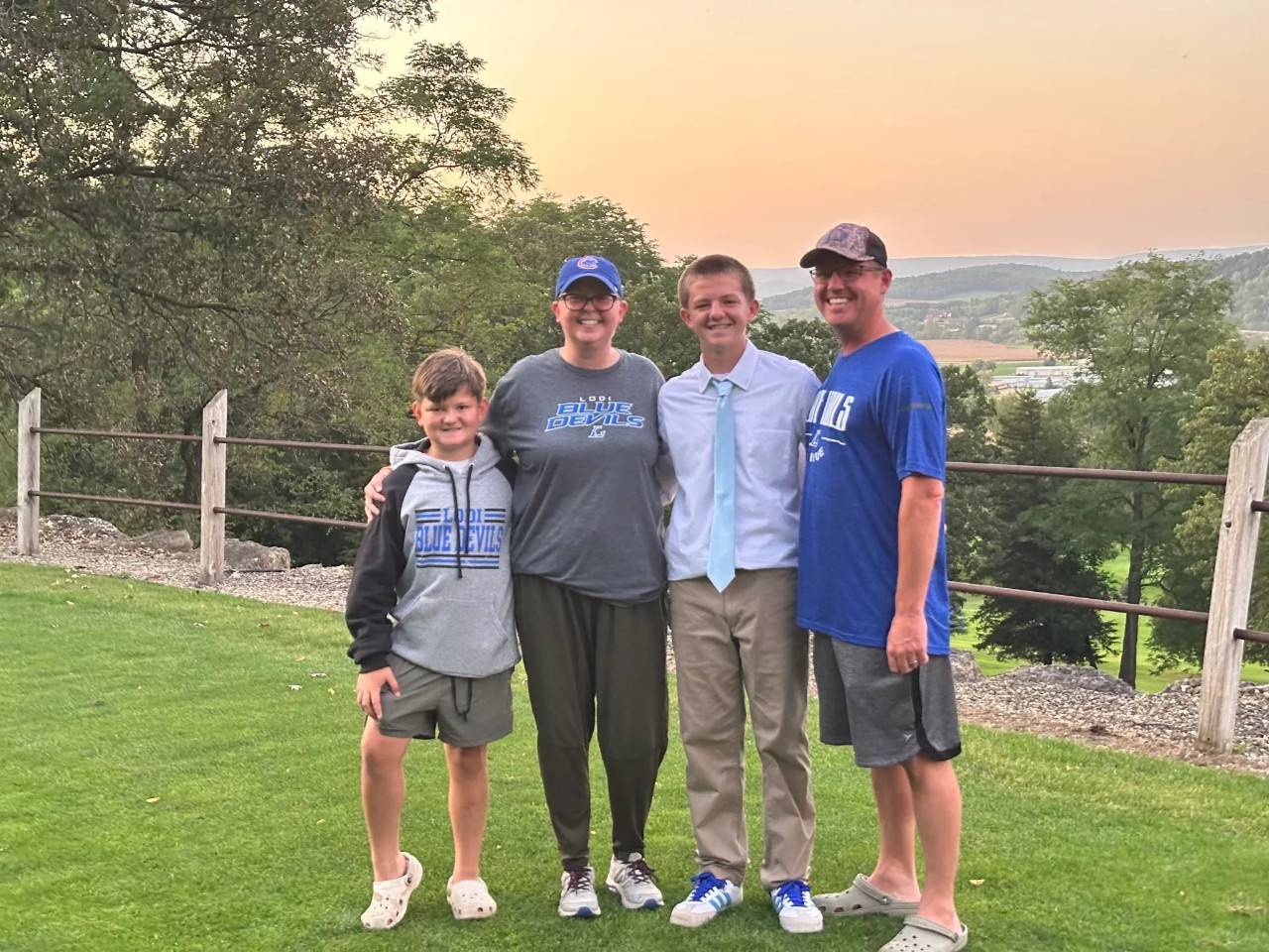 Family photo taken outdoors