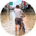 man with bike in water