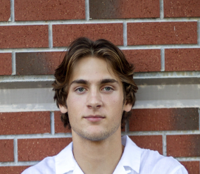Daniel Fudge, a young man wearing a white collared shirt, with medium brown hair. 