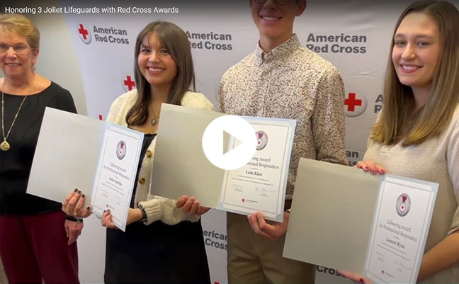 Three Joliett lifeguards receiving the Red Cross Lifesaving Award