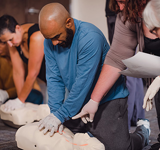 Employees being trained in CPR.