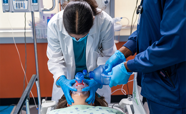 Procedural sedation being performed on an adult.