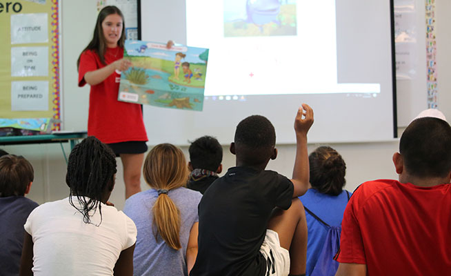 WHALE Tales Water Safety instructor with students.